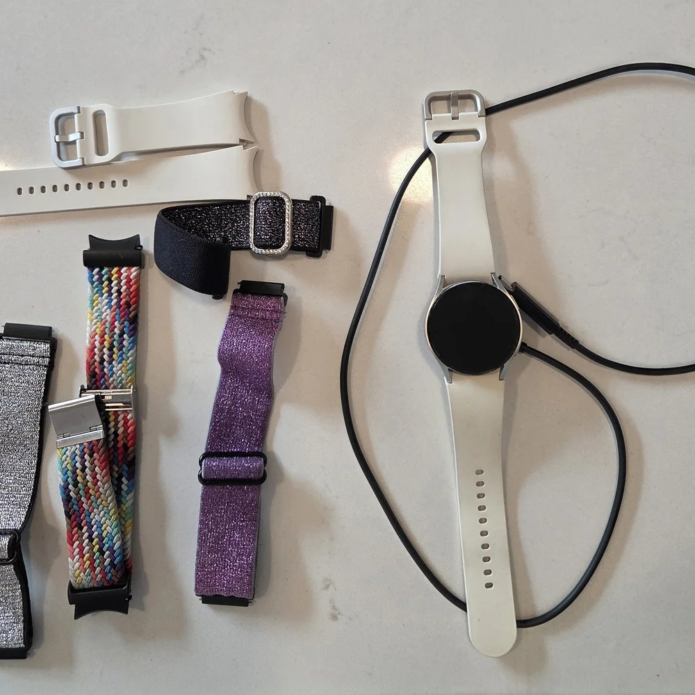 Versatile White Smartwatch with Multiple Bands